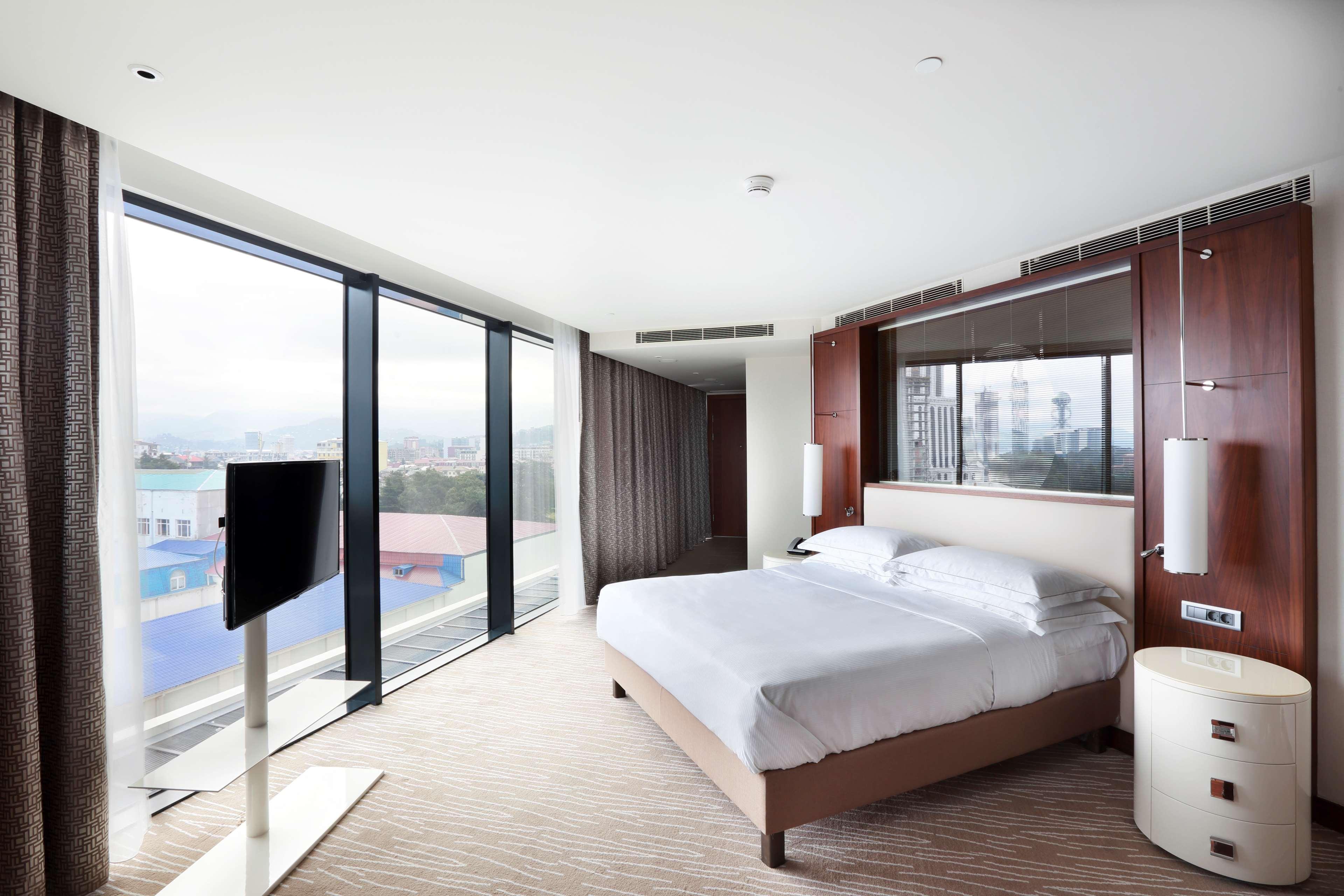 Hilton Batumi Hotell Eksteriør bilde A bedroom at the hotel